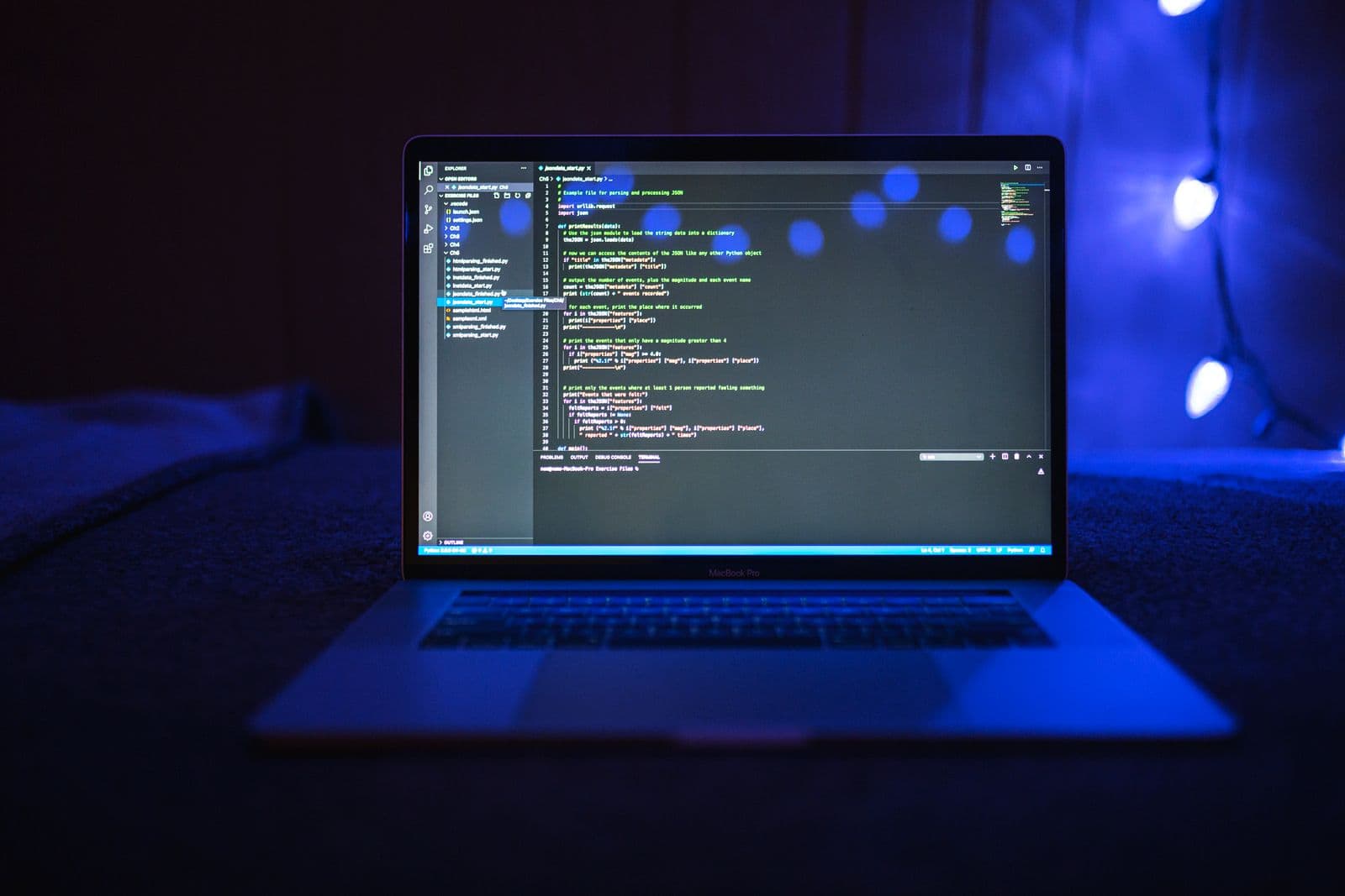 Laptop screen showing lines of programming code