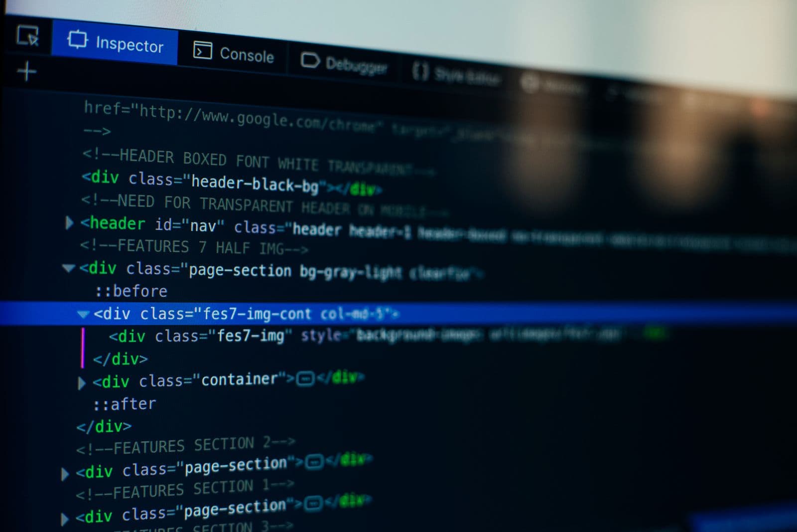 Detailed view of HTML code displayed on a computer monitor